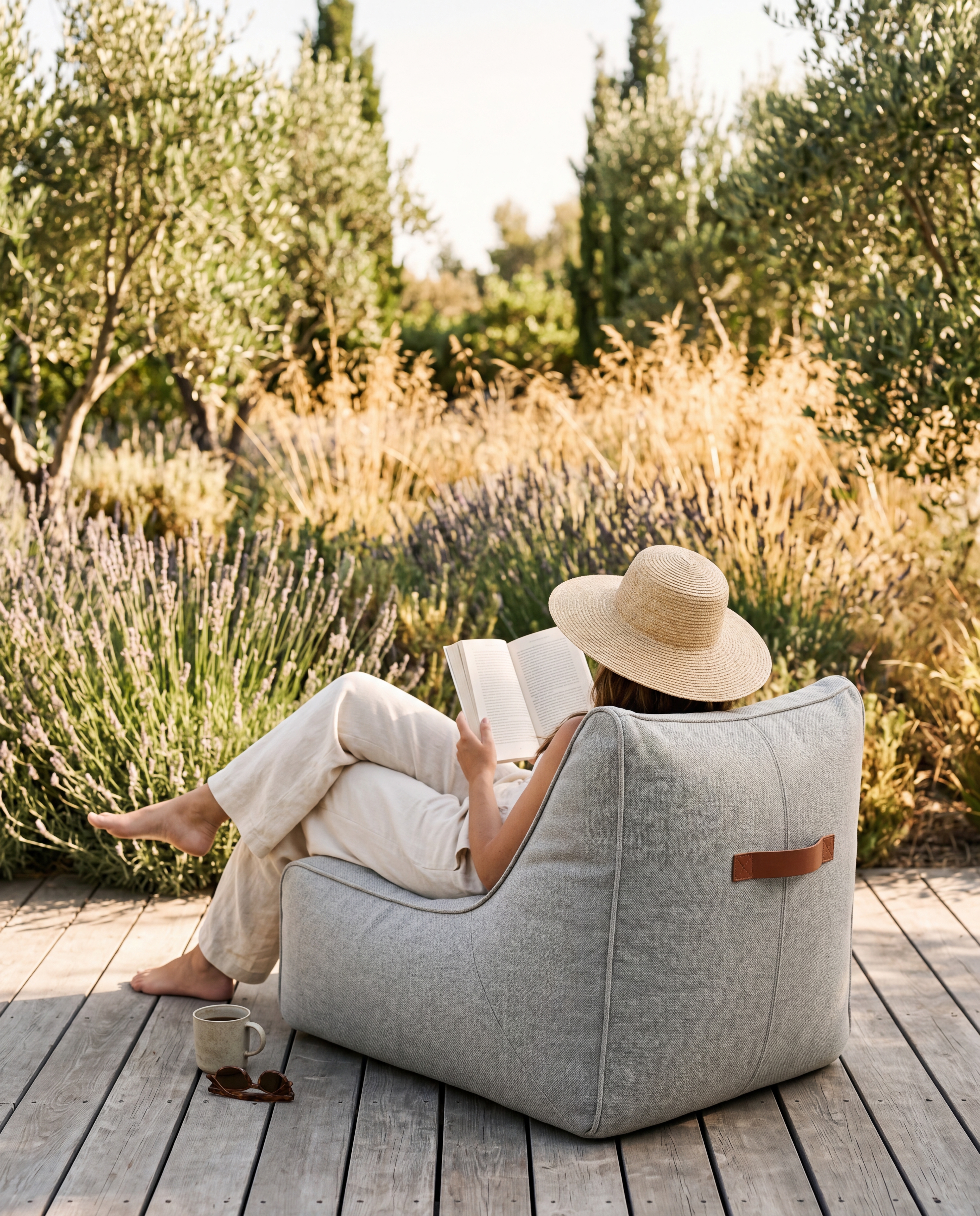 Woman reading in ruusta lounge chair among lavender fields